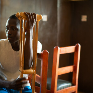 Young Man with Crutches